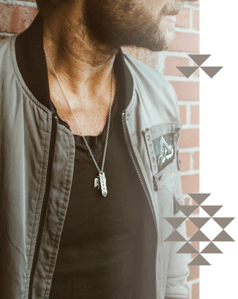 Eric Hinman wearing a Mountain Hawk Provisions necklace